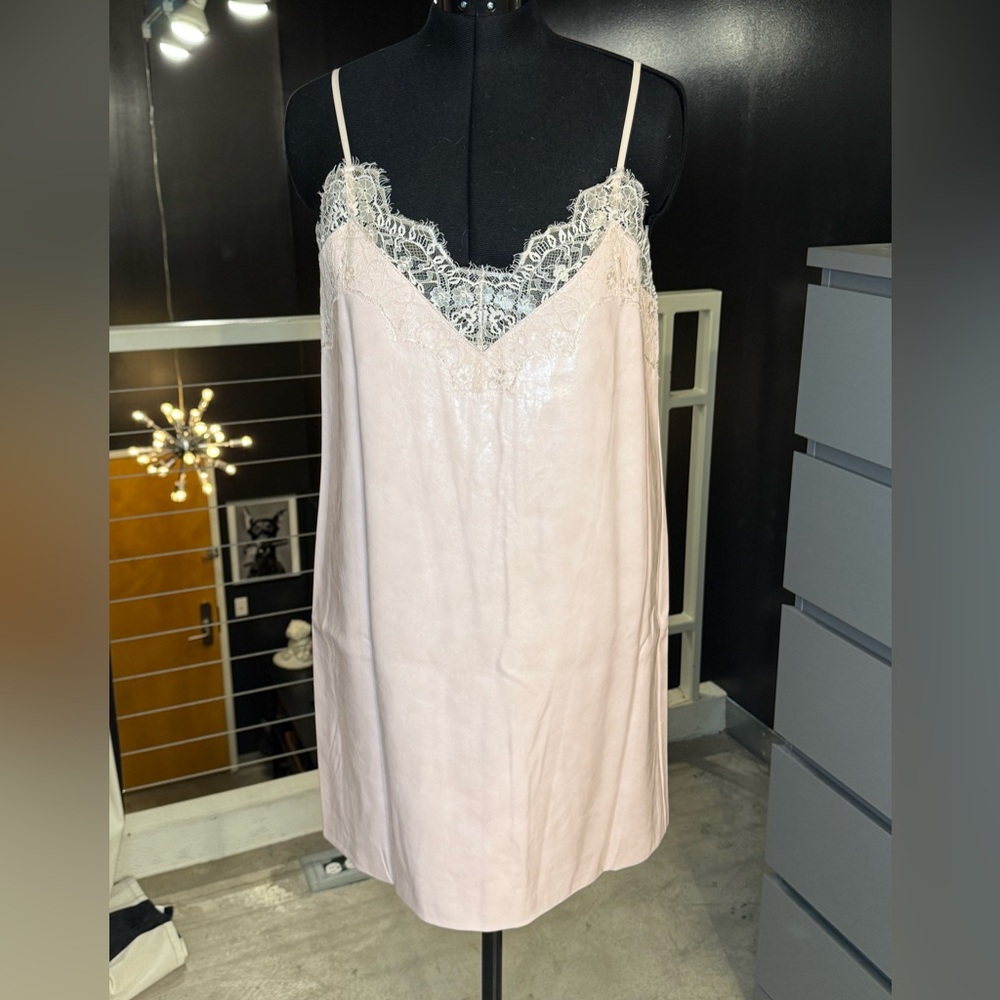 Elegant Lace-Trimmed Blush faux leather dress